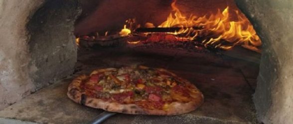 Wood burning stove with pizza
