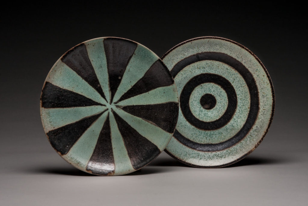 2 blue and brown plates with pie and circular design by Mark Skudlarek, Cambridge Woodfired Pottery