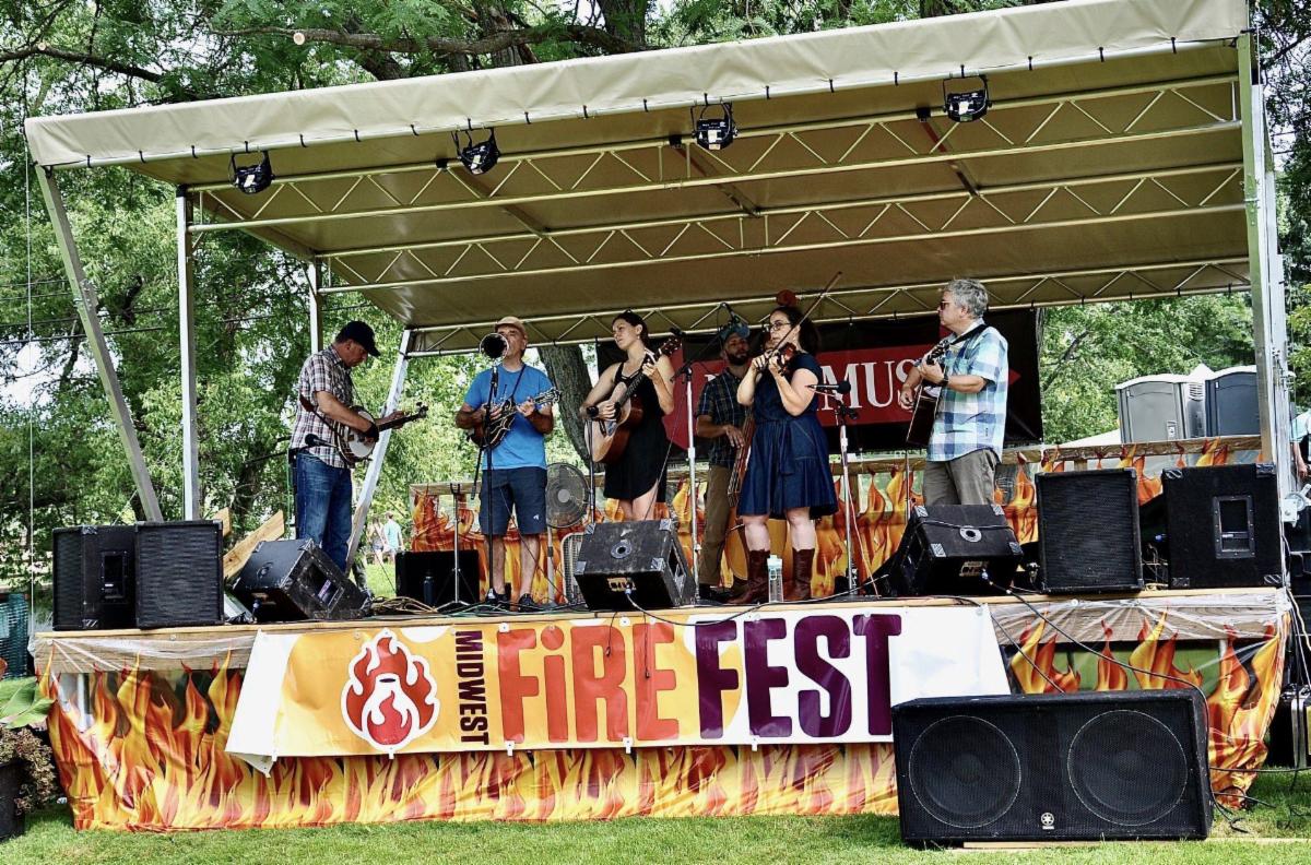 5 piece band on stage at Midwest Fire Fest